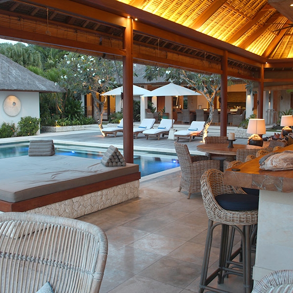 The spacious living pavilion is a great place to relax by the pool